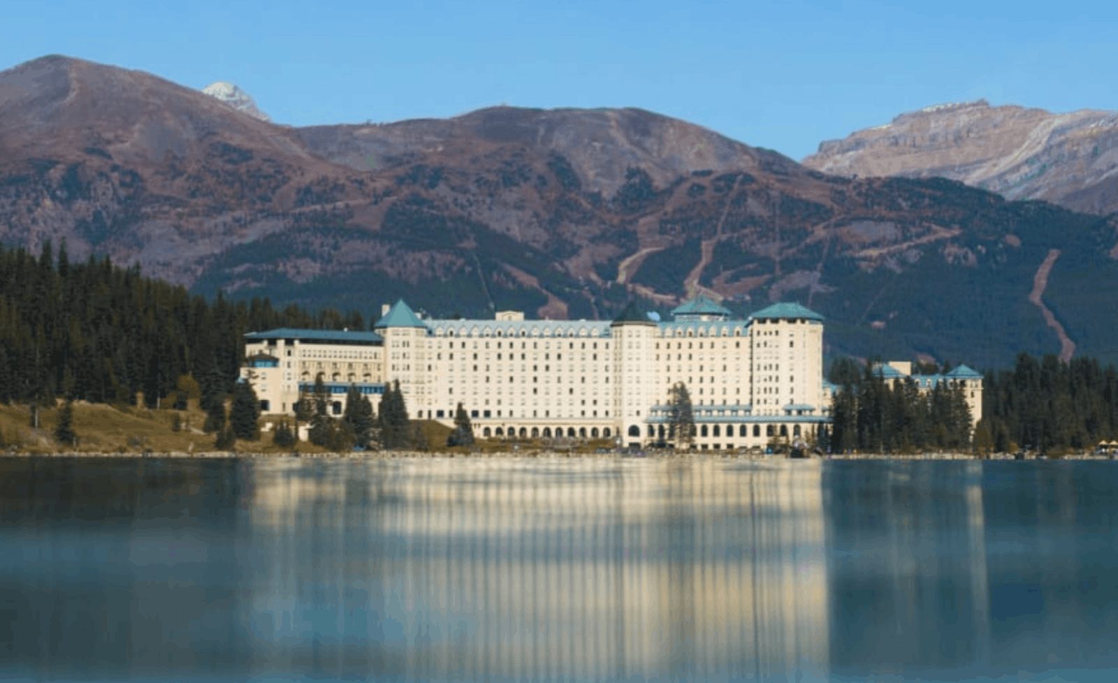 Fairmont Château Lake Louise beside turquoise Lake Louise in the Canadian Rockies, Alberta