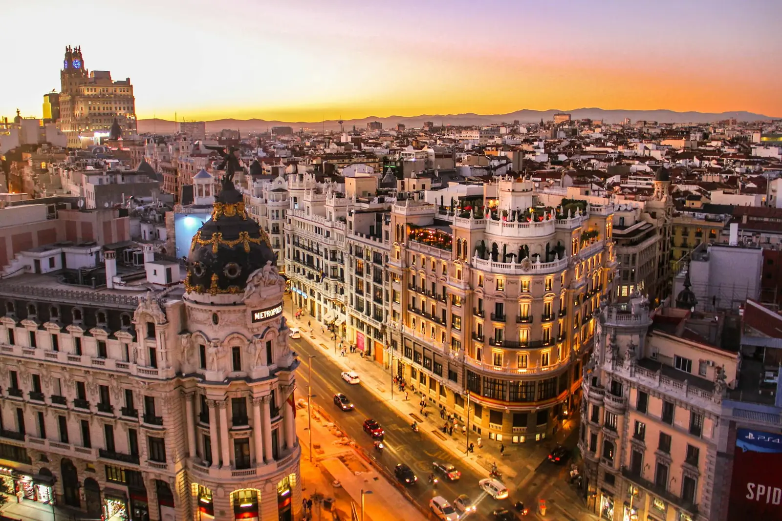 The Gran Via and its landmark Metropolis Building in Madrid at sunset, Spain