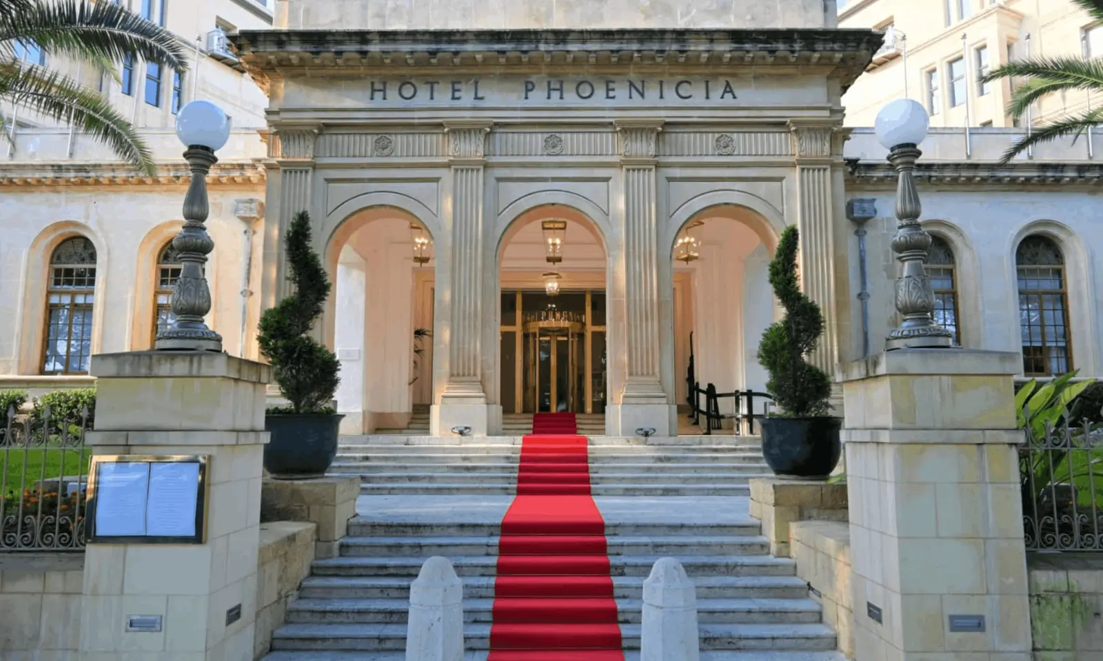 The grand red-carpet entrance and Art Deco facade of The Phoenicia Malta in Valletta