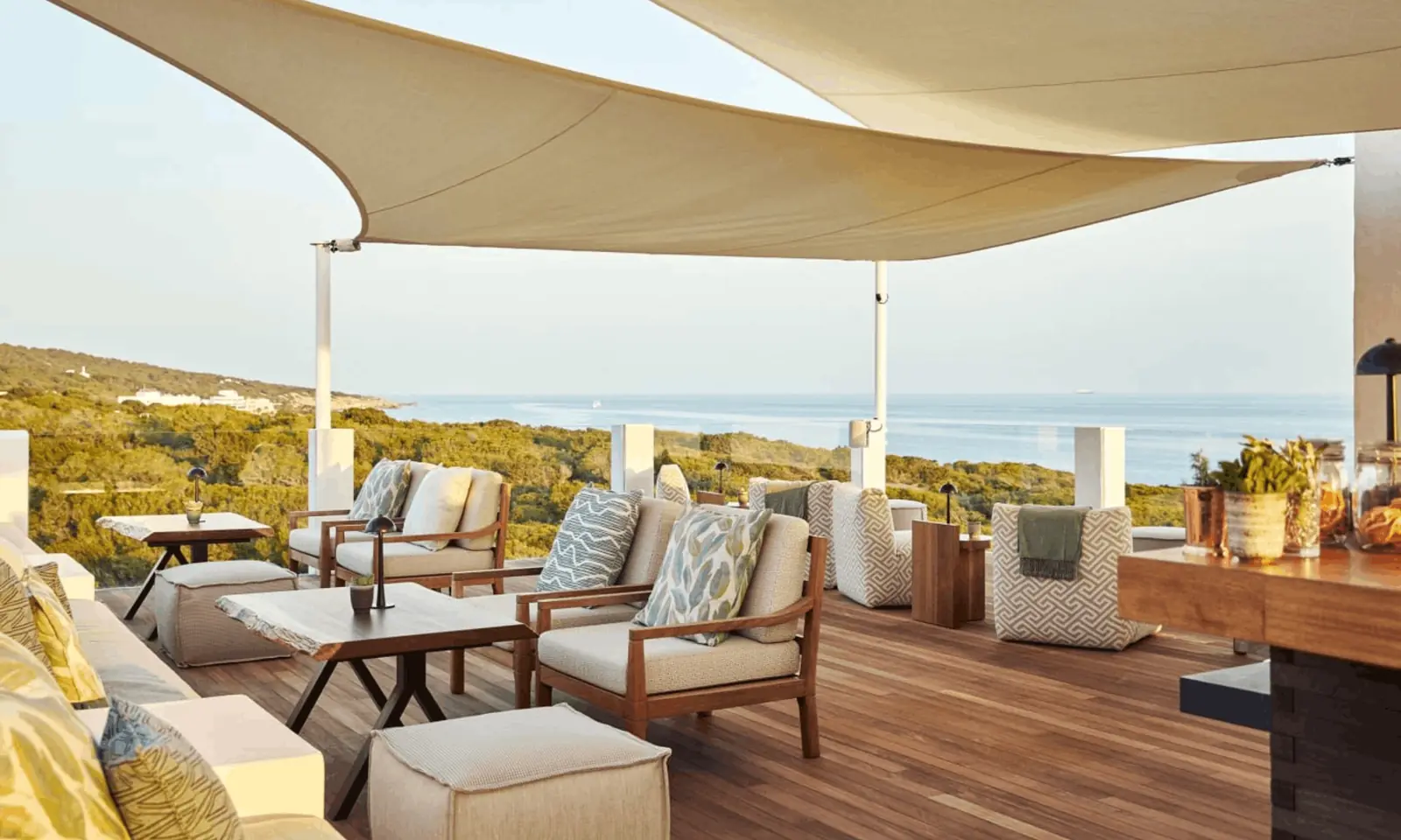 A sea-view terrace lounge with sail shades at Teranka, Formentera, Spain
