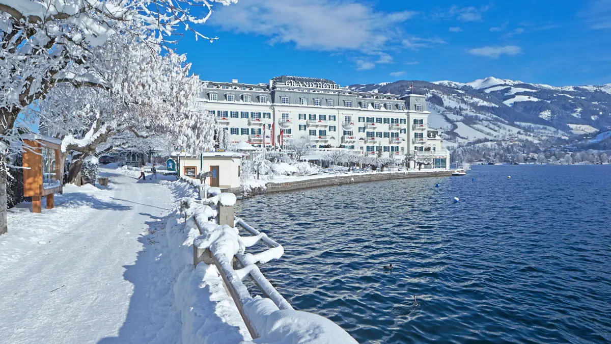 Grand Hotel Zell am See exterior on its private peninsula overlooking Lake Zell